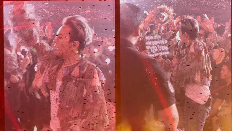 GD下台互動，還親切幫粉絲把應援牌翻正。（圖／讀者提供）