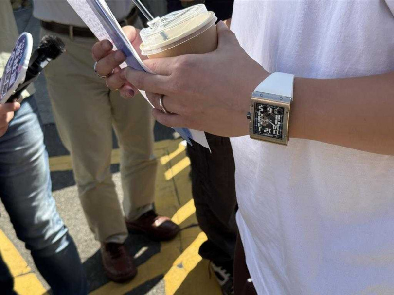 15號神秘型男也戴著Richard Mille品牌腕表。(圖/中國時報寶智華攝)