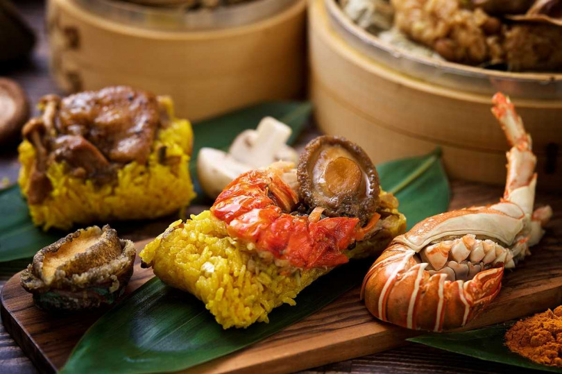 「躍金龍皇粽」將活跳跳的新鮮小龍蝦與彈嫩九孔鮑結合，讓消費者感受大海鮮味。（1,080元／顆，線上獨享優惠價3,880元／4入，圖／神旺潮品集提供）