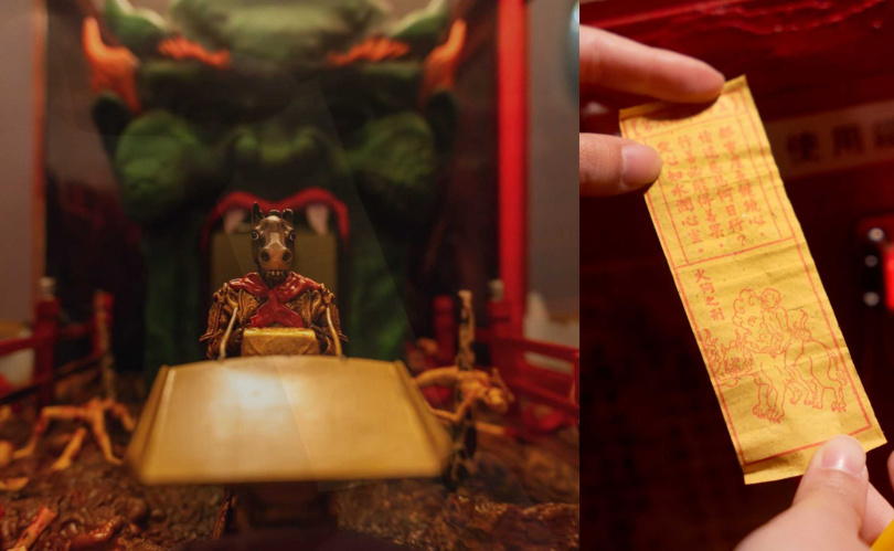 《地獄籤詩》動力機械裝置仿造廟宇裡的仙女籤紙機加上自製的3D列印地獄怪獸模型、造景和聲光效果，投入10元硬幣後牛頭馬面會進入鬼頭中搬出籤詩。（圖／擷取自月津港燈節官網）