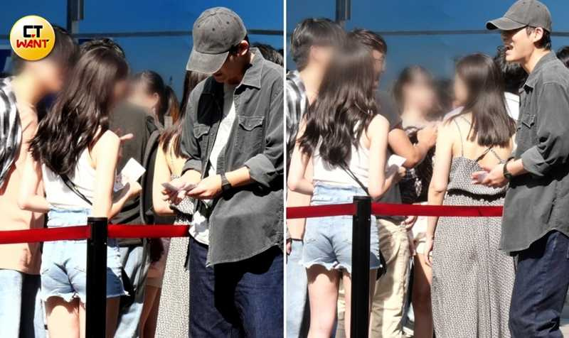 帽沿壓低的周渝民在跟臨演兜售電影票。(圖/本刊攝影組)