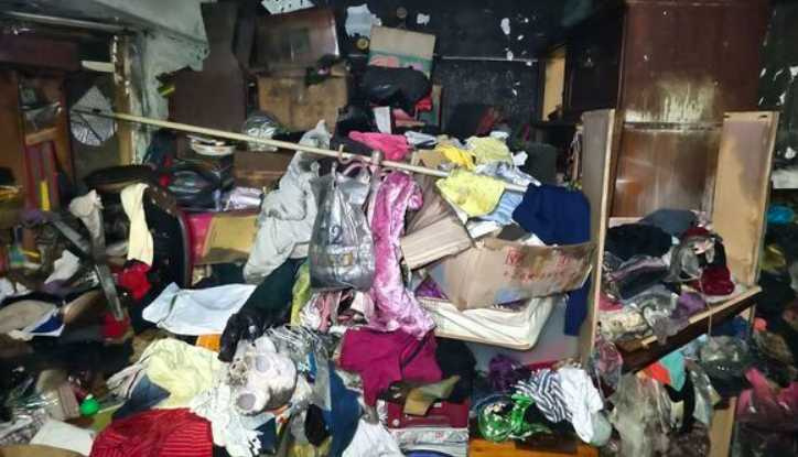 基隆市消防局仁愛分隊小隊長詹能傑,為救出被屋內眾多雜物而受困女子不幸殉職。(圖/翻攝畫面)