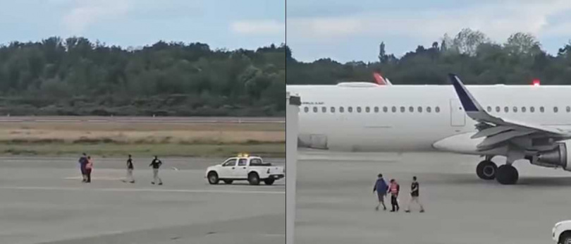 男子肉身攔機沒多久被保全人員帶離停機坪，隨後也遭警方逮捕。（圖／翻攝自臉書／Terremoto en Talcahuano）