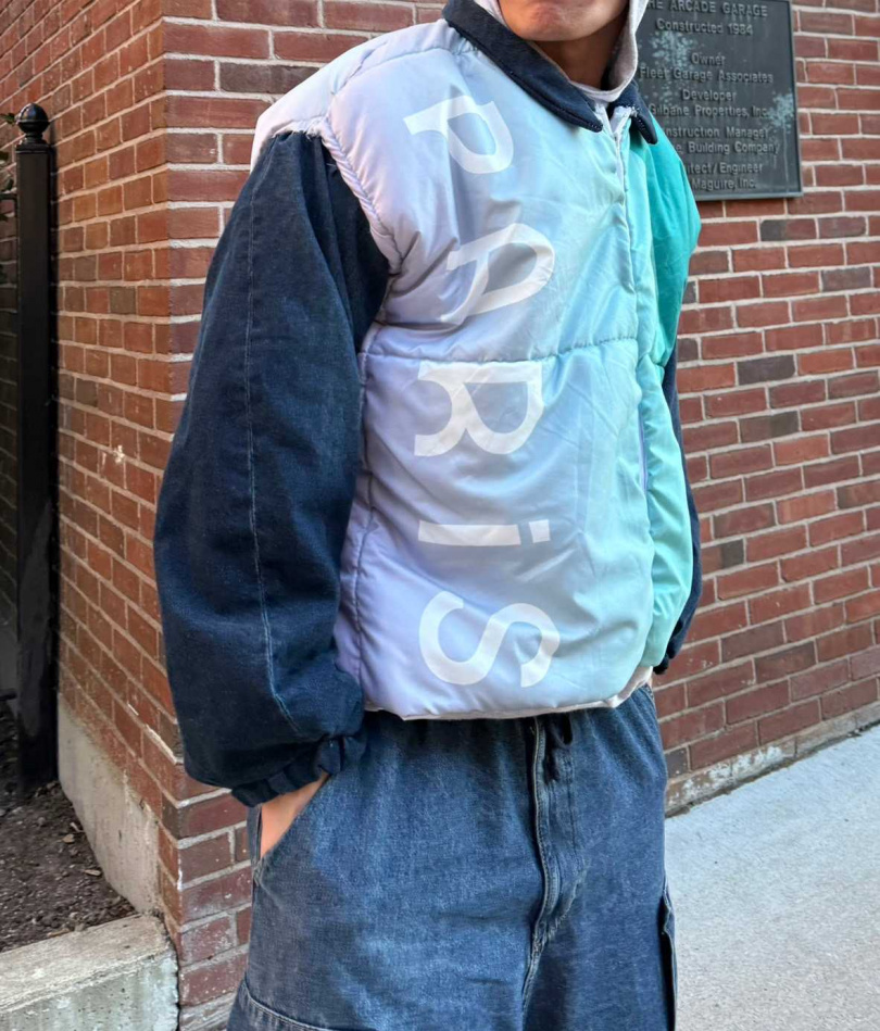 陳弈通用一個月在YouTube上自學改造世界唯一奧運棉被外套。（圖／陳弈通提供）