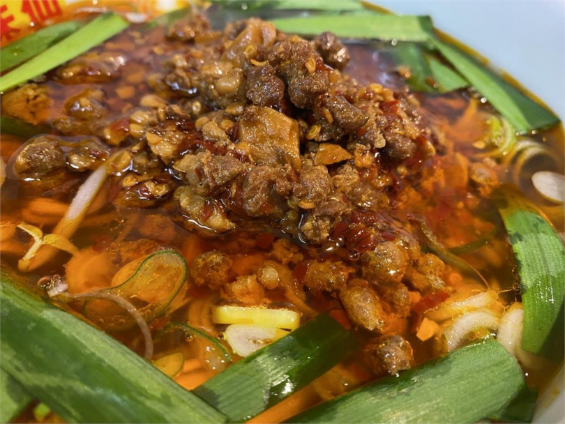 老K指出愛知縣的「台灣料理」文化最早起源自當地知名店家「味仙」推出的台灣拉麵。(圖/翻攝自X)