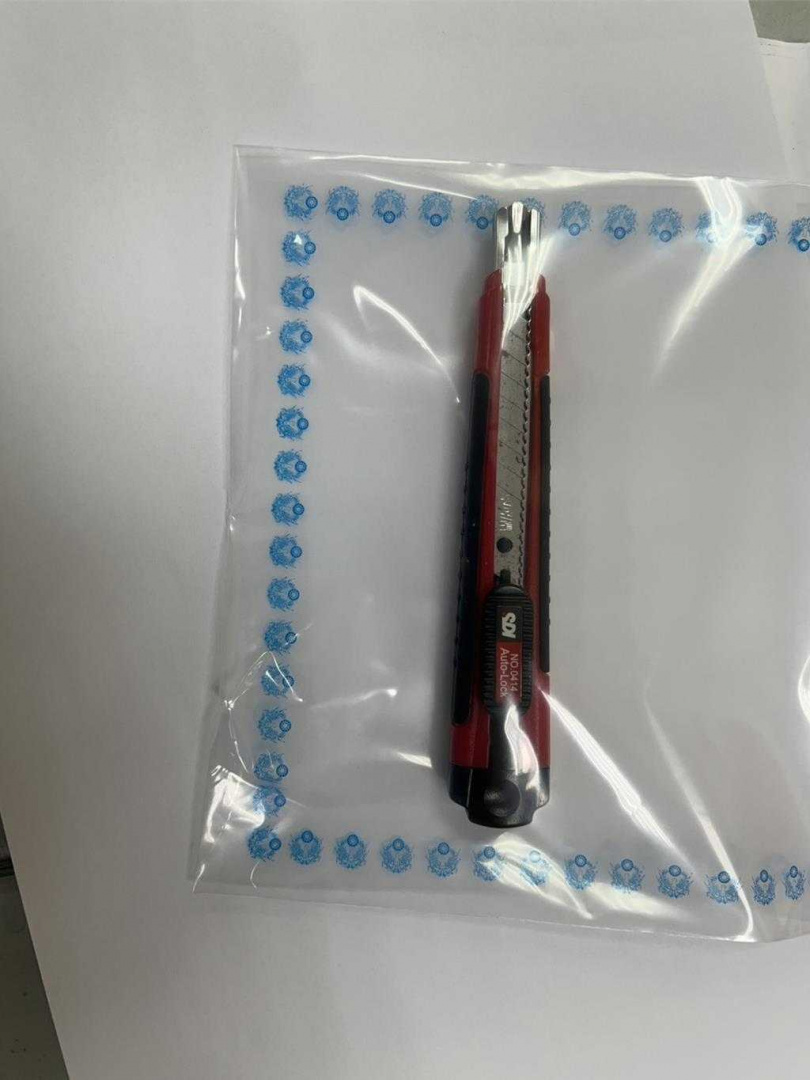 柯男使用之美工刀。（圖／三重警分局提供）