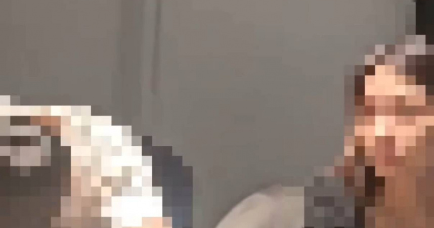 前方陳男（左）、卓女觀影時用手機引後方觀眾不滿，雙方為此爆發衝突。（圖／翻攝畫面）