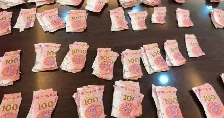 武漢農商銀行動員團隊耗時20多天，從上萬張紙幣碎片中逐一拼接、核驗。（圖／翻攝自微博）