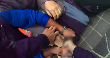 邱姓男子2025年12月20日在三民高中捷運站外高喊「我有槍」，當場遭警方逮捕，並於6日被起訴。（圖／翻攝畫面）