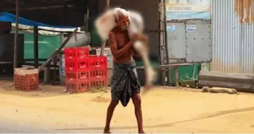 印度一名男子為了提領過世姊姊帳戶內的存款，竟將其遺骨挖出並帶到銀行門口。（圖／翻攝自Malayam Newspaper）