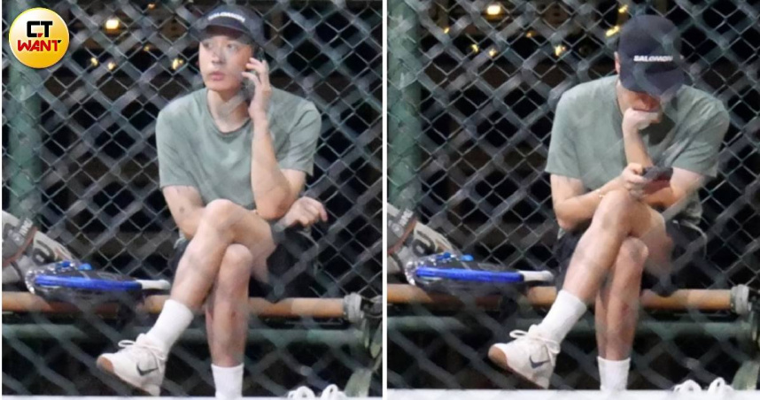 周湯豪轉性深夜跑球場，不過很多時間都在滑手機忙著回應社群上的粉絲問答。（圖／本刊攝影組）