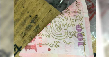 撿到「畫符咒紙鈔」男憂被詛咒 網友驚呼:是招財錢母