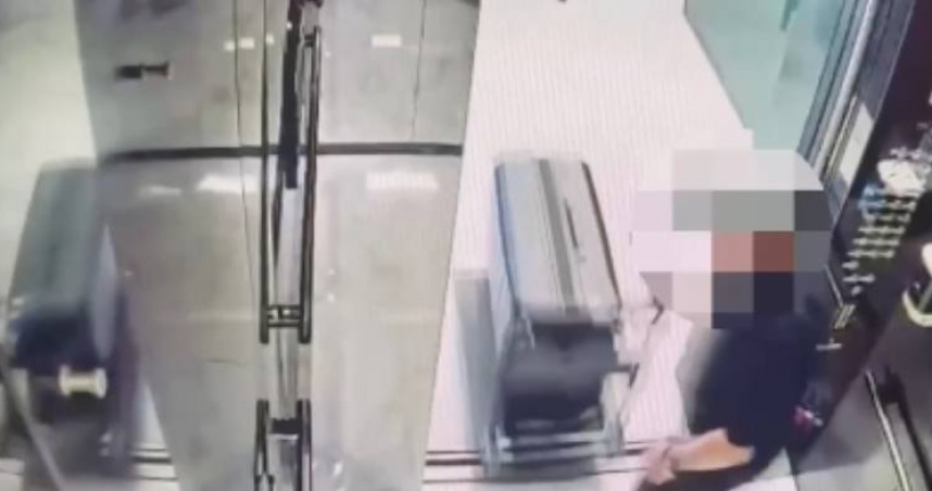一名吳姓男子因不滿被女友提分手，竟將泰籍女友掐死裝行李箱藏於辦公室內的冰箱內。（圖／翻攝畫面）