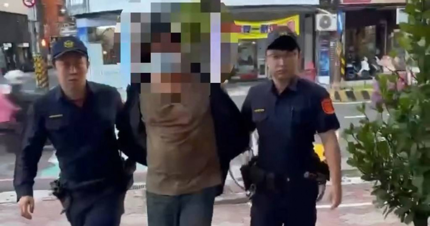 嫌犯陳男胸前衣物沾滿血跡，被警方帶回警局時神情低落，僅表示太衝動了。（圖／報系資料照）