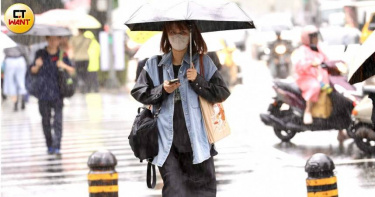 氣象署表示，明後天（11日、12日）又將有新一波滯留鋒面北移接近台灣，各地降雨機率再度提高。（圖／方萬民攝）