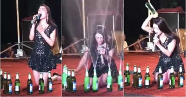 有片/長髮女跪地高歌 激甩整排酒瓶…自帶「酒水噴泉」舞台效果網讚翻