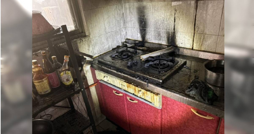 翁婦在廚房炸豬油發生油爆，導致油漬濺灑易燃物引發火警，造成她2度燒燙傷送醫。（圖／翻攝畫面）