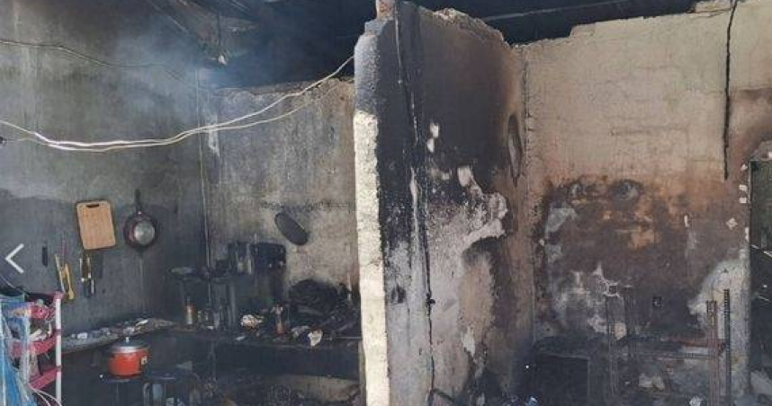 北投區杏林一路民宅發生火警，警消救出90歲受困老婦送醫治療。（圖／翻攝畫面）