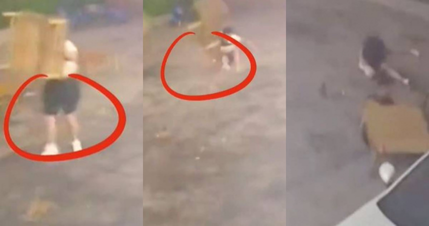 大陸一名男店員遭強風吹倒。（圖／翻攝自極目新聞）