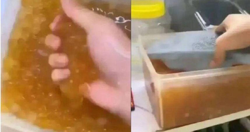 大陸一名手搖飲料店員工把拖鞋放進配料珍珠的桶子裡面，錄影後PO上網，引發軒然大波。（圖／翻攝自微博／第一現場）