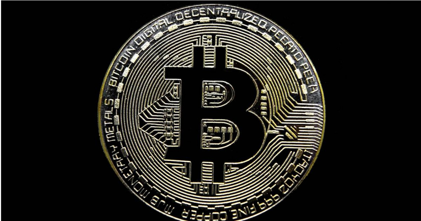 比特幣（Bitcoin）於美東時間21日攀升至歷史新高，打破了今年1月創下的紀錄。（圖／達志／美聯社）