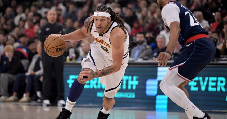 阿隆戈登最後的空中第一時間補灌拯救了金塊。(圖／達志／路透)