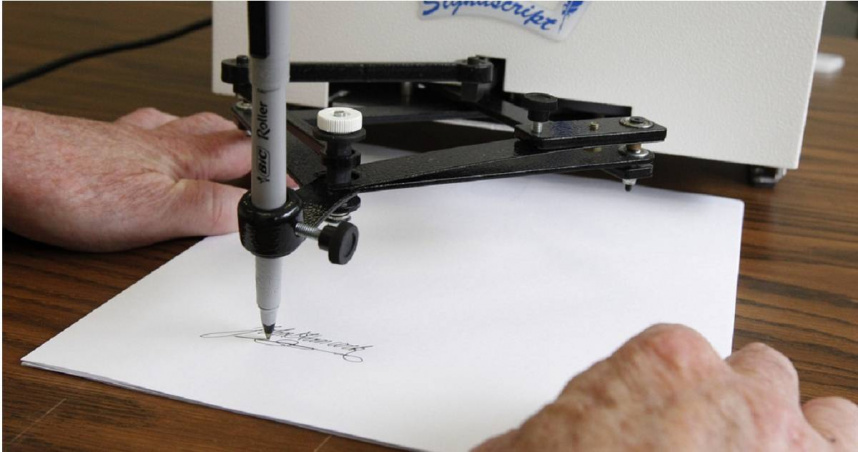 圖為桌面型自動簽名機。（圖／達志／美聯社）