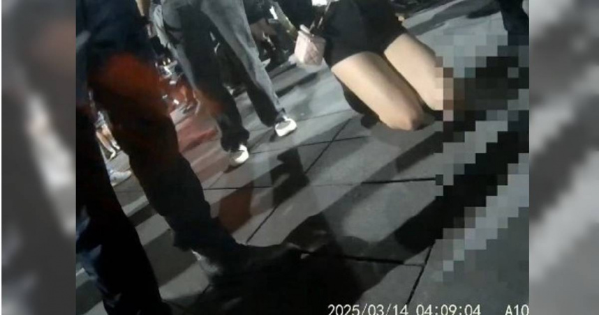 北市信義區夜店14日發生糾紛事故，一名葉姓男子酒後失控對警狂吼遭管束，女性友人見狀急忙下跪求情。(圖／翻攝畫面)