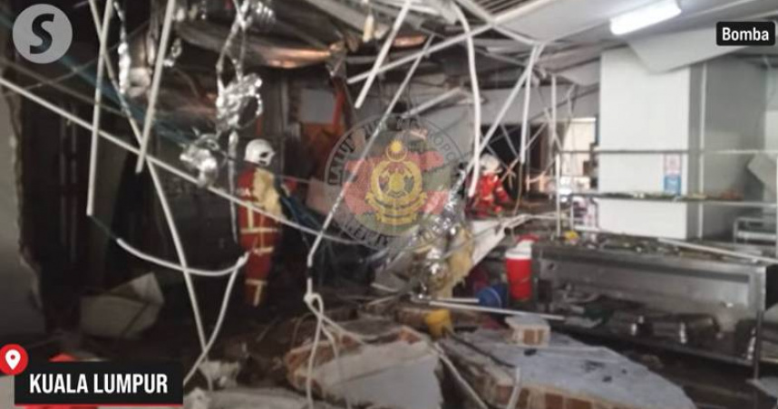 爆炸發生於精英大學四樓餐廳，牆面坍塌、碎裂瓦礫散落一地。（圖／翻攝自馬來西亞The Star）