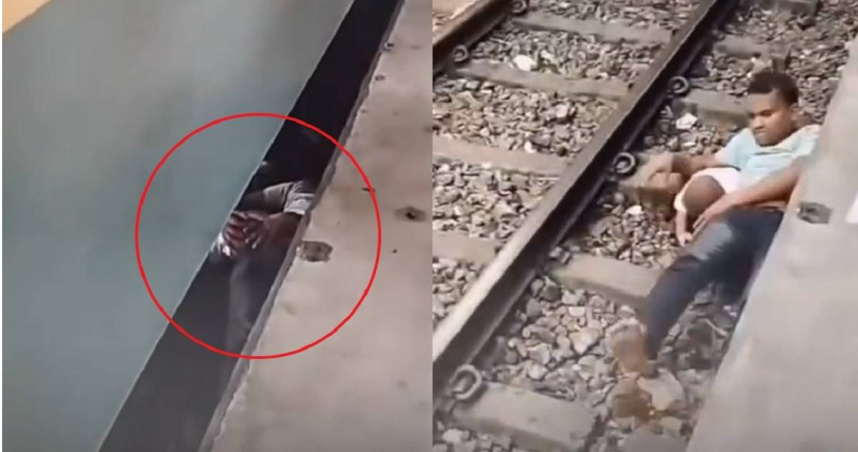 孟加拉一名男童在火車站不慎跌落軌道，父親馬上跟著跳下以肉身護兒，驚悚畫面在網上引發討論。（圖／翻攝自臉書／somoynews.tv）