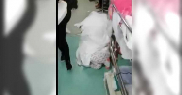 武漢肺炎/3屍體蓋白布攤地沒人理 醫院人手吃不消