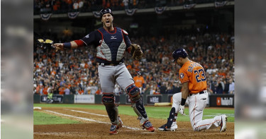 冠軍捕手重新簽約回老東家國民。　（圖／美聯社）