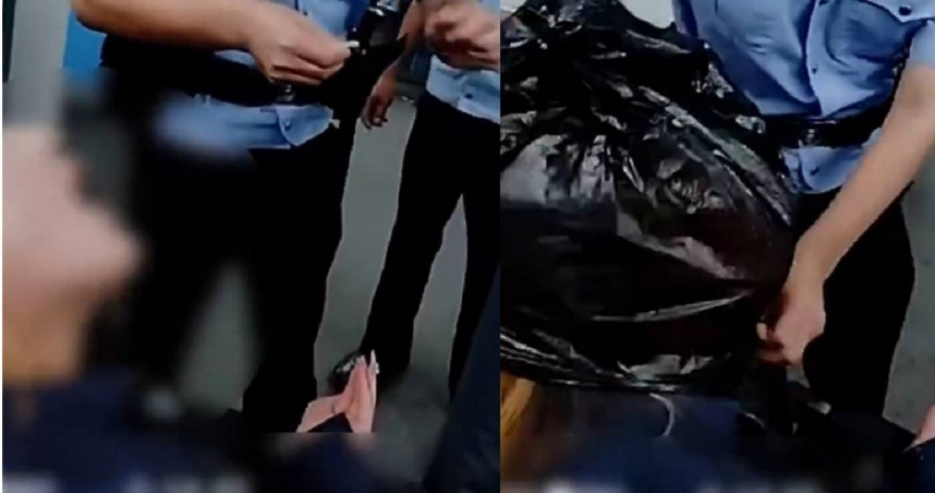 大陸一對情侶吵架後，女子疑似情緒激動過度呼吸，靠機靈員警協助用袋子呼吸法穩定情緒。（圖／翻攝自微博／現代快報）