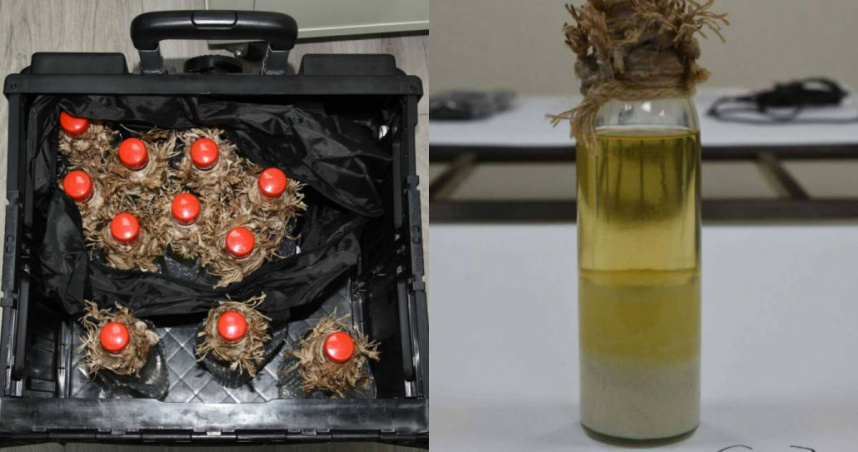 張文自製汽油彈。（圖／翻攝畫面）