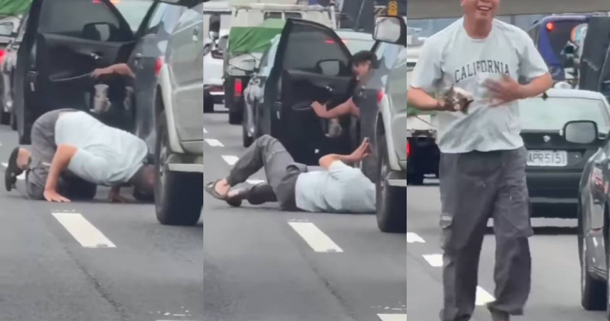 阿伯車陣中突趴地鑽車底救貓。(圖/翻攝自記者爆料網)
