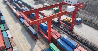 SCFI運價指數終止連三漲。（圖／新華社）