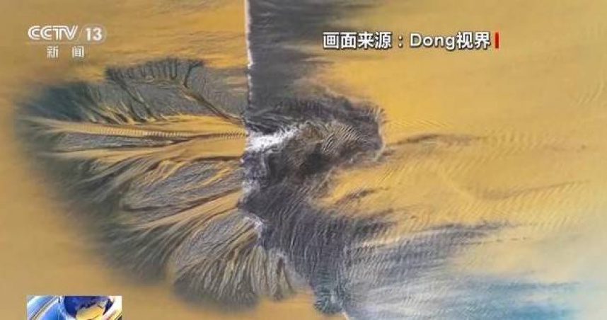 清明連假期間，一段由大陸網友空拍的「浙江嘉紹大橋下潮水雕出奇幻潮汐樹」畫面在網路上迅速走紅。（圖／翻攝自央視）