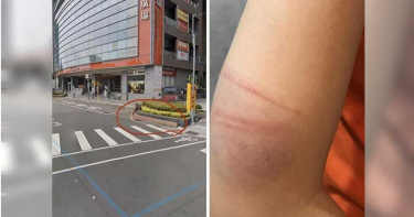 人妻等紅燈過馬路 突遭怪大叔雨傘攻擊