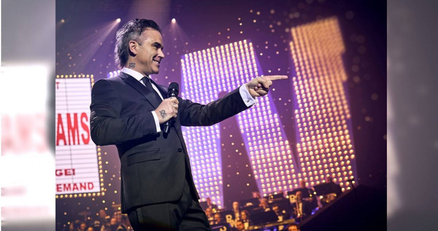 《更好的人》羅比威廉斯當年來台舉辦演唱會，曾被形容大鬧機場對媒體嗆聲。（圖／台北双喜提供）