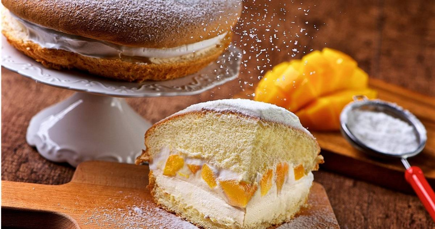 「芒果小波派」在厚實蛋糕中夾入芒果鮮奶油，香甜不膩口。（800元，圖／神旺普諾麵包坊提供）