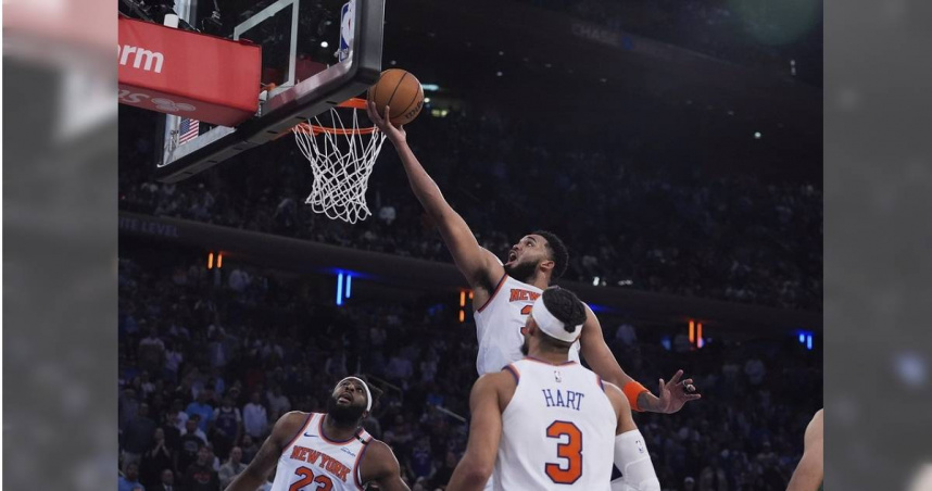 尼克中鋒唐斯輕鬆切入禁區上籃放進兩分。(美聯社)