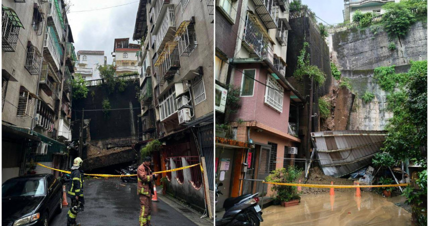 新北市新店區錦秀社區因連日大雨發生土石滑落，整片擋土牆崩落，泥土及石塊四散一地。（圖／翻攝畫面）