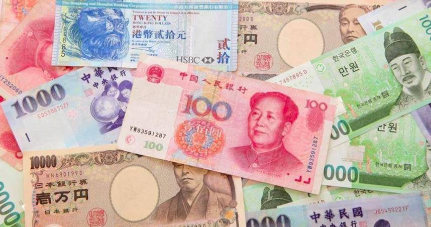 創紀錄！香港金管局又斥資605.43億港元購買美元。（圖：shutterstock）