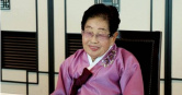 南韓保險公司「韓華財產保險」（Hanwha General Insurance）100歲資深女保險業務員金淑子（音譯，김숙자）。（圖／翻攝自臉書／韓聯社）